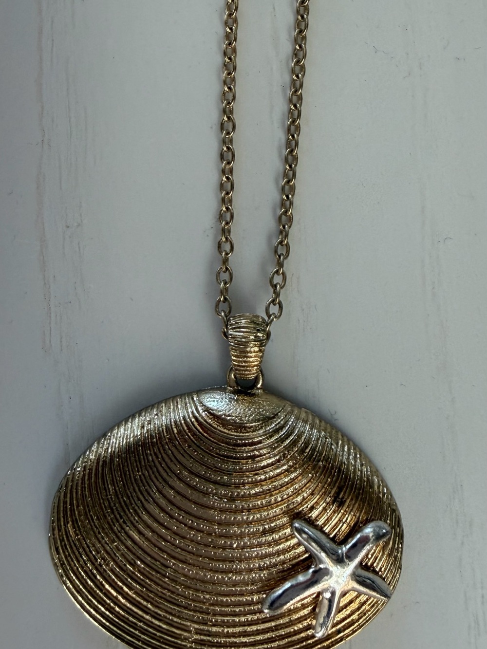 Gold Tone Shell Pendant Necklace with Silver Starfish Accent